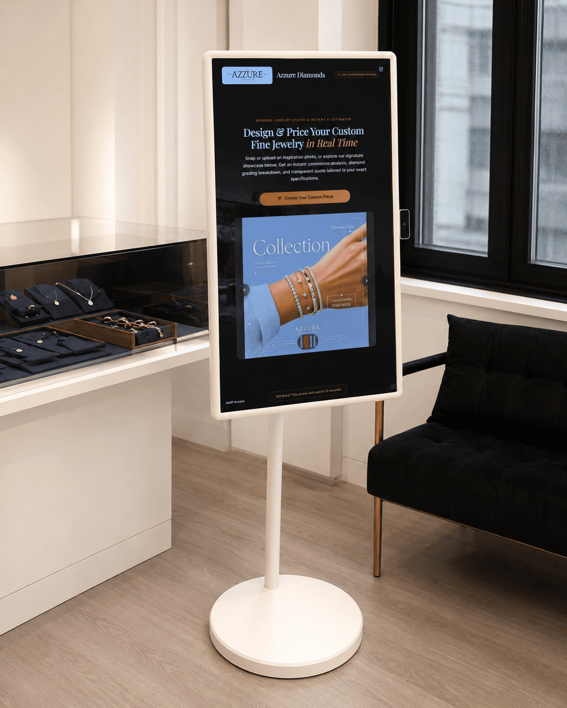 AUZZY showroom workstation beside a fine jewelry display